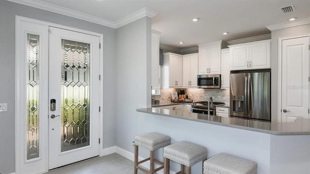 Furnished interior view inside a new home in Esplanade at Azario Lakewood Ranch, Bradenton (Image 20).