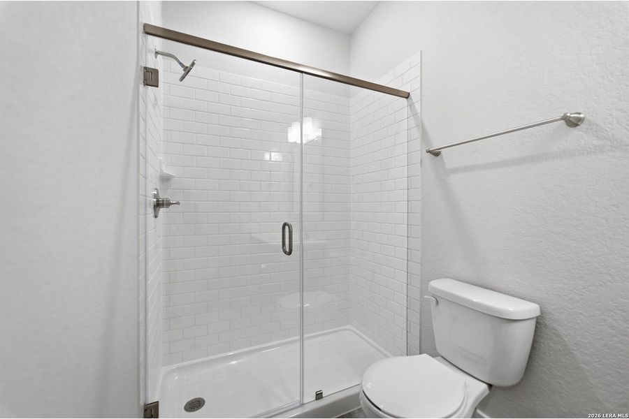 Furnished interior view inside a new home in The Woodlands at Medina Hills, Mico (Image 14).