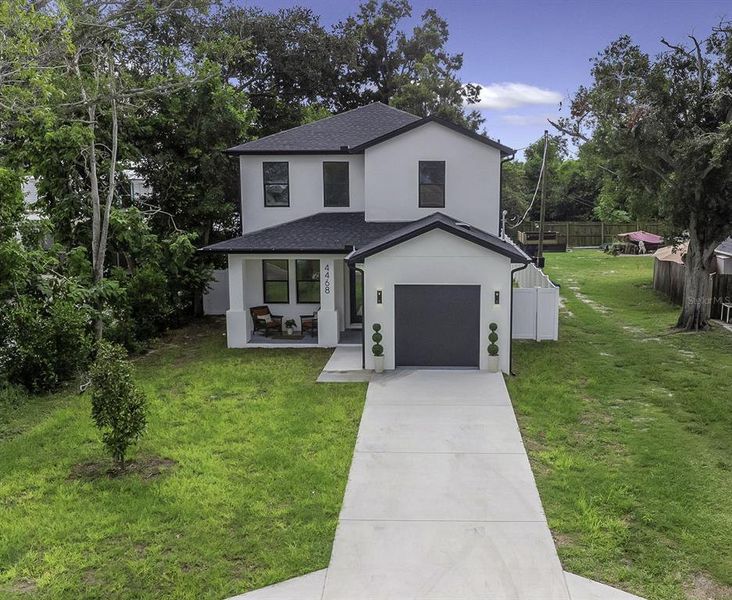 Front exterior of a new home in , St. Petersburg, FL, highlighting curb appeal (Image 23). Front exterior of a new home in , St. Petersburg, FL, highlighting curb appeal (Image 23).