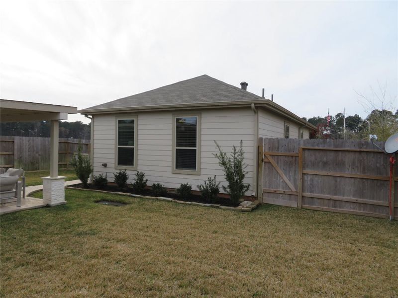 Exterior details and patio area of a home in Sagecrest Trails, Conroe (Image 4). Exterior details and patio area of a home in Sagecrest Trails, Conroe (Image 4).