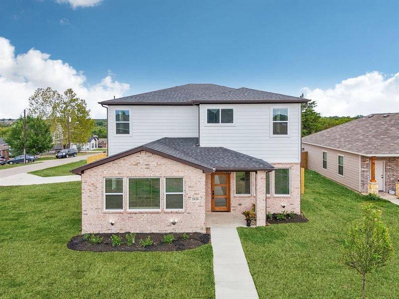 View of front of home with a front lawn