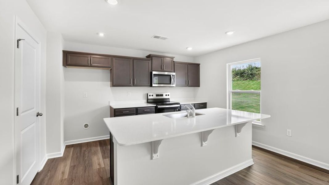 Furnished interior view inside a new home in Treemont Commons, Wellford (Image 9).