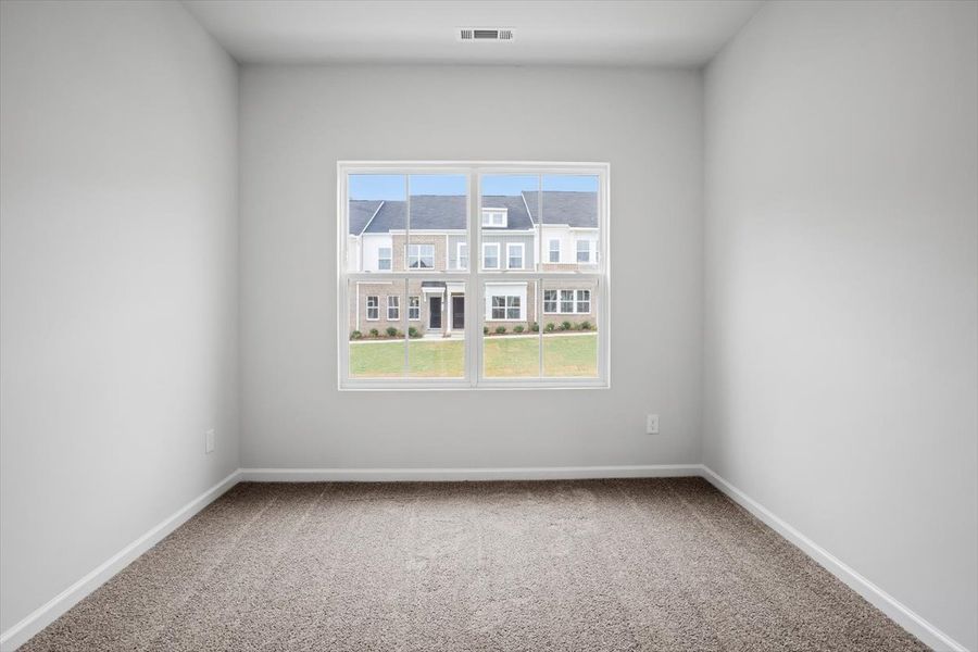 Spacious, unfurnished interior of a new home in Renaissance at White Oak, Garner (Image 19).