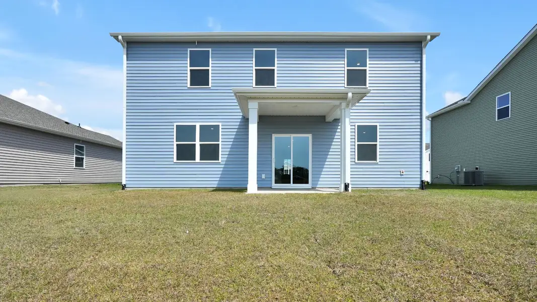 Exterior details and patio area of a home in Driftwood, Richlands (Image 3).