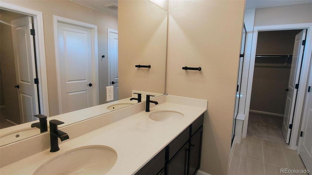 Furnished interior view inside a new home in The Cottages Collection at Ridgeline Vista, Brighton (Image 4).