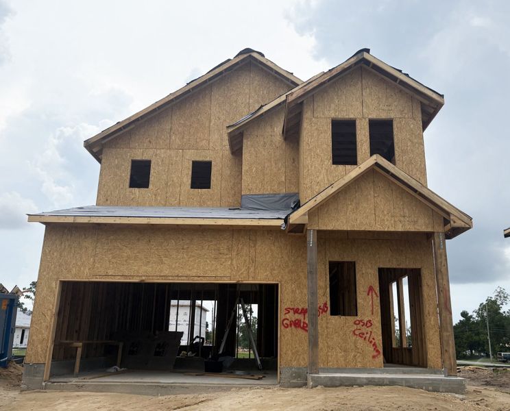 Front exterior of a new home in Saltaire, Panama City, FL, highlighting curb appeal (Image 2). Front exterior of a new home in Saltaire, Panama City, FL, highlighting curb appeal (Image 2).