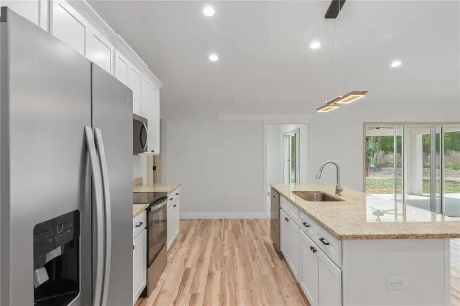 Furnished interior view inside a new home in , Ocala (Image 18).