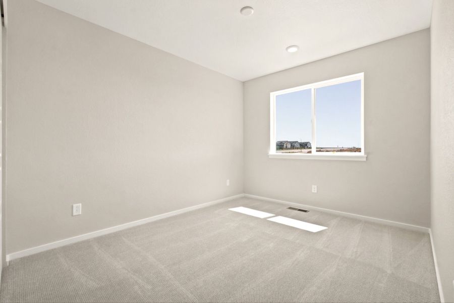 Spacious, unfurnished interior of a new home in Sky Ranch, Watkins (Image 24).
