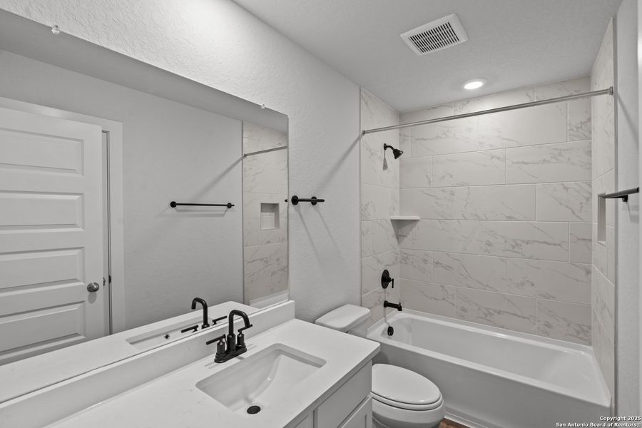 Furnished interior view inside a new home in August Fields, New Braunfels (Image 9).