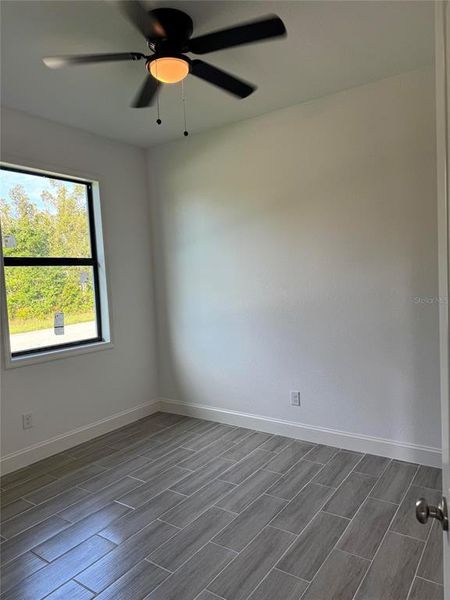 Spacious, unfurnished interior of a new home in , Port Charlotte (Image 10).