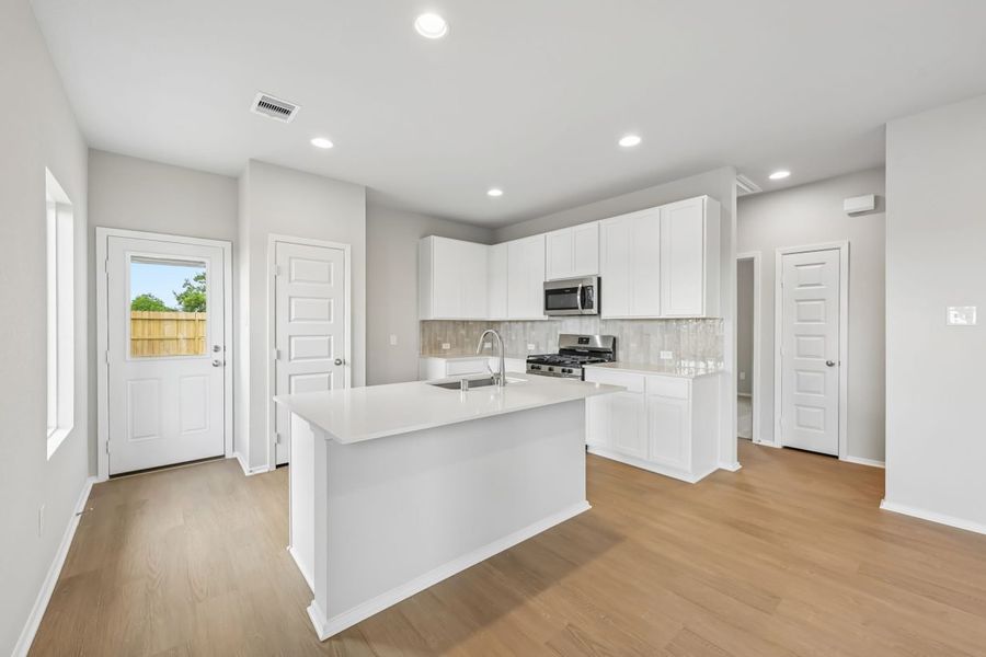 Furnished interior view inside a new home in Azalea, Pattison (Image 5).