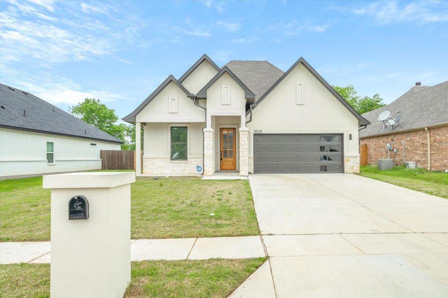 Front exterior of a new home in , Canton, TX, highlighting curb appeal (Image 22).