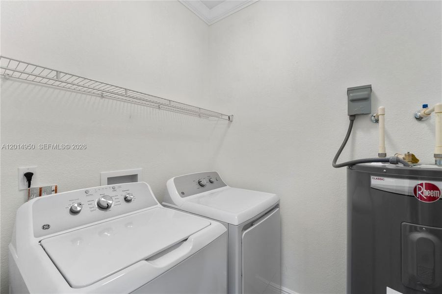 Laundry room with washer and dryer