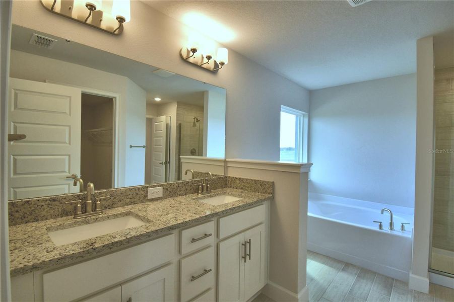 Furnished interior view inside a new home in Lake Juliana Estates, Auburndale (Image 13).