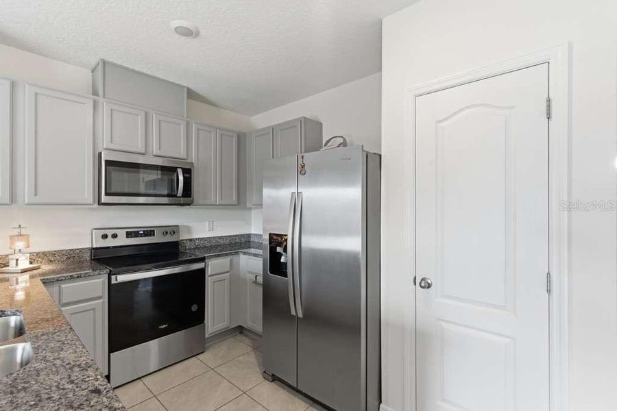 Furnished interior view inside a new home in Brentwood, Davenport (Image 9).