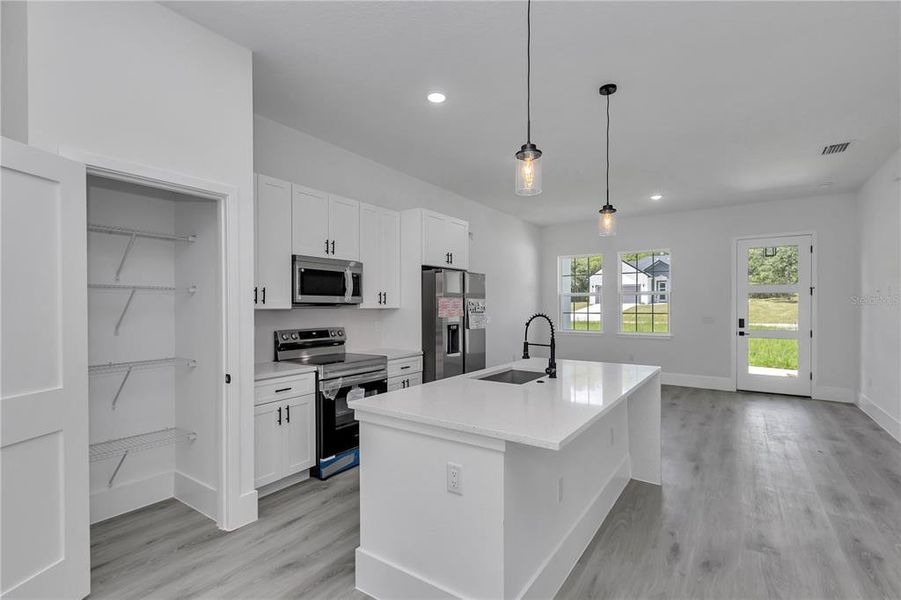Furnished interior view inside a new home in , Dunnellon (Image 13).