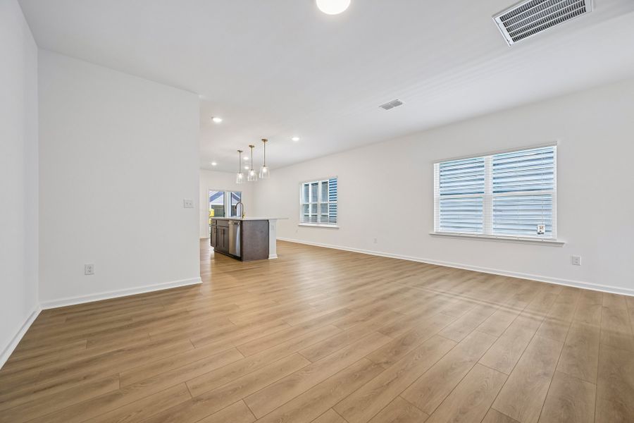 Representative unfurnished interior of a home built from the Emma II by Ashton Woods in The Point, Rolesville (Image 11).