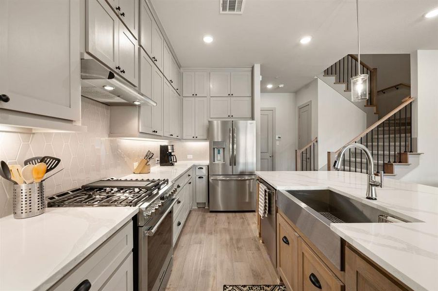 Furnished interior view inside a new home in , Farmers Branch (Image 18).