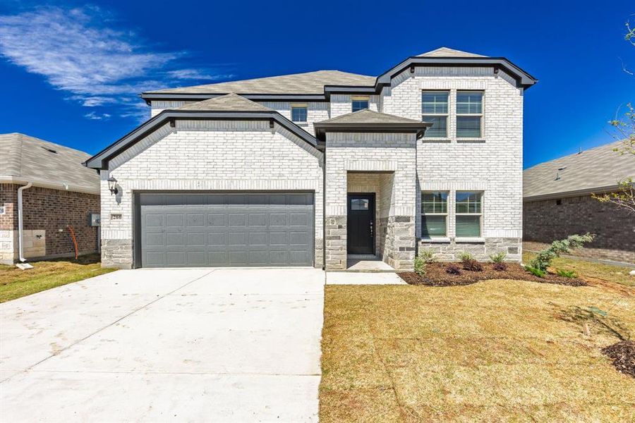 Front exterior of a new home in Stratton Place, Greenville, TX, highlighting curb appeal (Image 18). Front exterior of a new home in Stratton Place, Greenville, TX, highlighting curb appeal (Image 18).