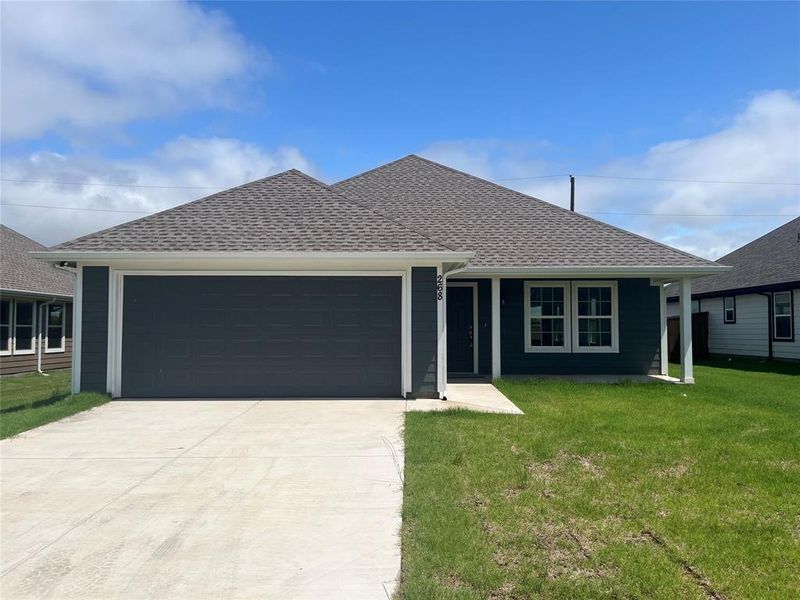 Front exterior of a new home in , Trenton, TX, highlighting curb appeal (Image 2). Front exterior of a new home in , Trenton, TX, highlighting curb appeal (Image 2).