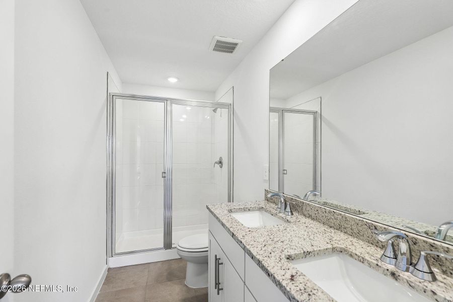 Furnished interior view inside a new home in The District at Oakleaf - The Commons, Middleburg (Image 8).