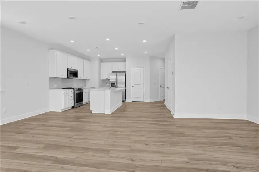 Spacious, unfurnished interior of a new home in Towns at Holly Springs, Holly Springs (Image 16).