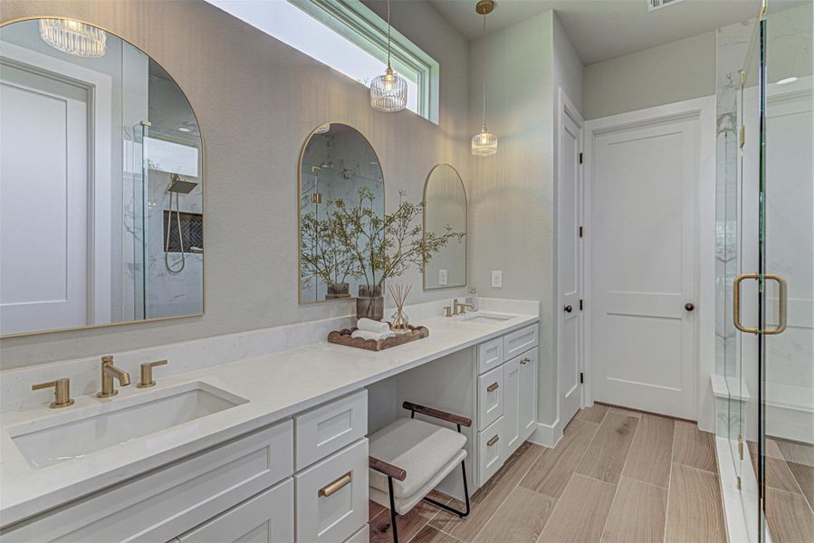 Full bathroom featuring double vanity.