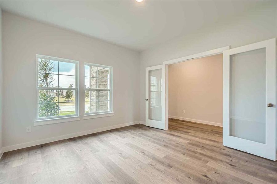 Spacious, unfurnished interior of a new home in The Estates Collection at Overland Grove, Forney (Image 12).