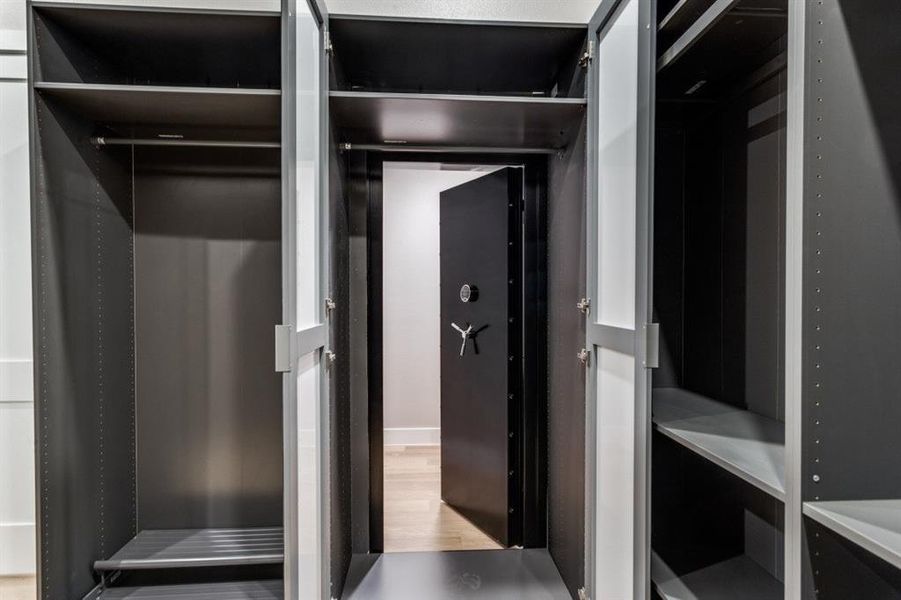 Safe room/storm shelter behind mirrors in primary closet