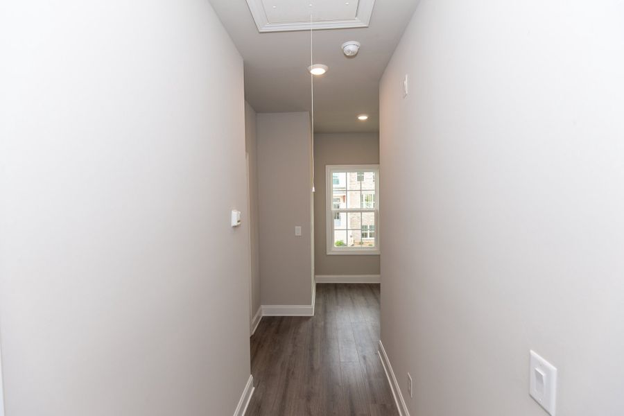 Representative unfurnished interior of a home built from the The Charleston by The Providence Group in Aberdeen, Hoschton (Image 22).