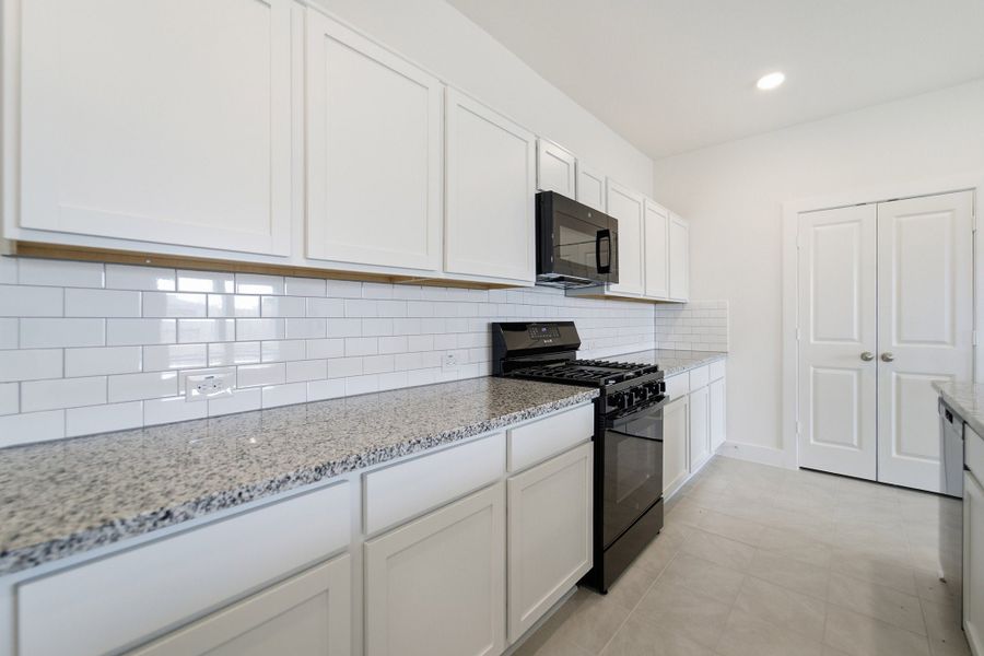 Furnished interior view inside a new home in Harvest Pointe, Needville (Image 9).