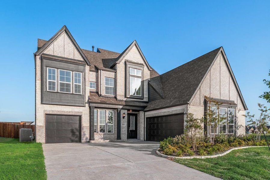 Front exterior of a new home in Park Trails, Forney, TX, highlighting curb appeal (Image 2). Front exterior of a new home in Park Trails, Forney, TX, highlighting curb appeal (Image 2).