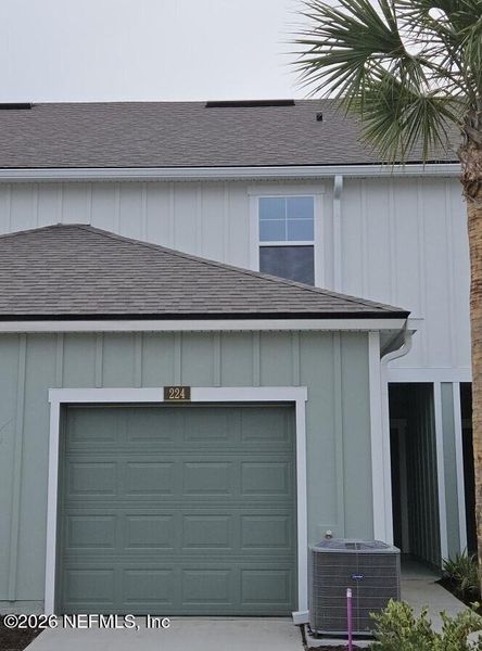 Front exterior of a new home in Liberty Cove, Yulee, FL, highlighting curb appeal (Image 29).