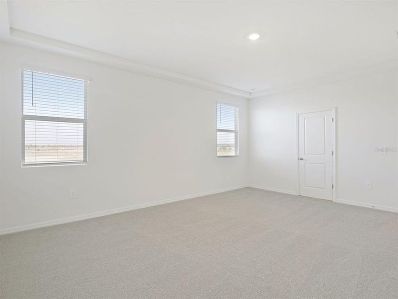 Spacious, unfurnished interior of a new home in Coasterra - Reserve Series, Palmetto (Image 30).