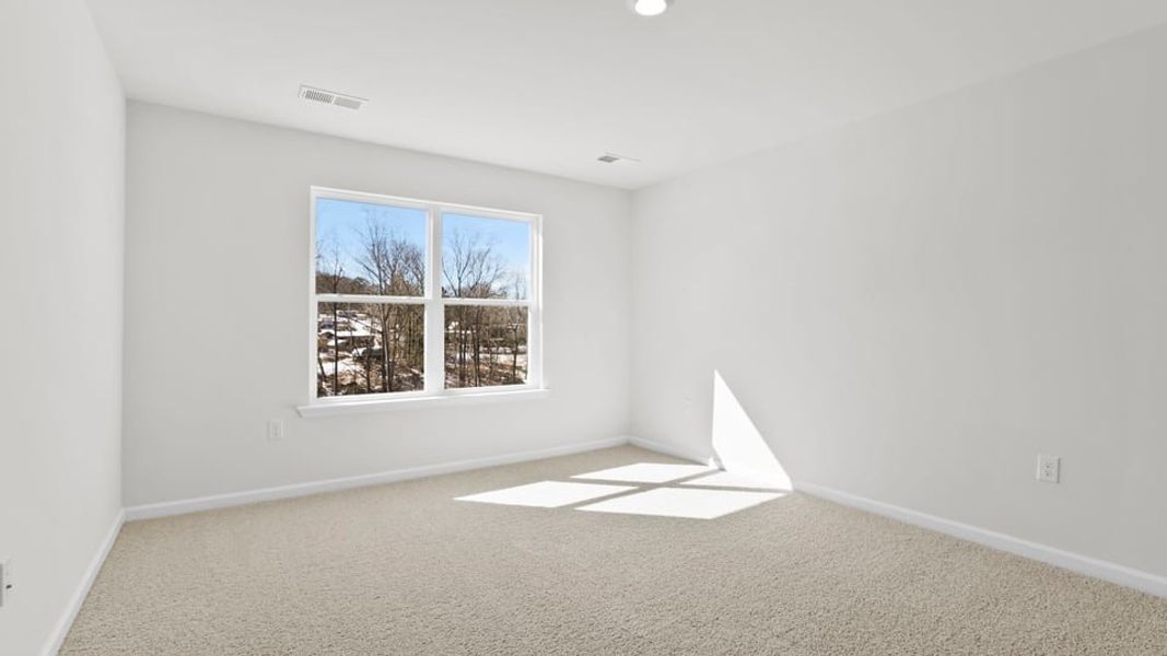 Spacious, unfurnished interior of a new home in Village Grove, Greenville (Image 29).