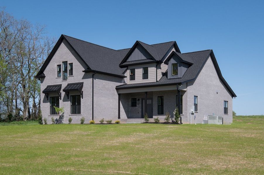 Exterior details and patio area of a home in Whisper Hill, Wendell (Image 35).