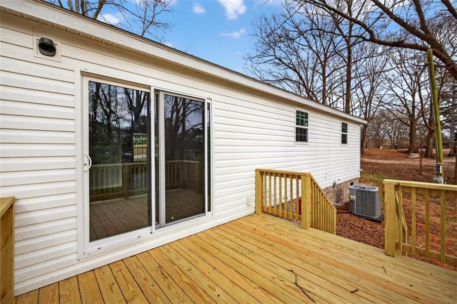 Exterior details and patio area of a home in , Loganville (Image 24).