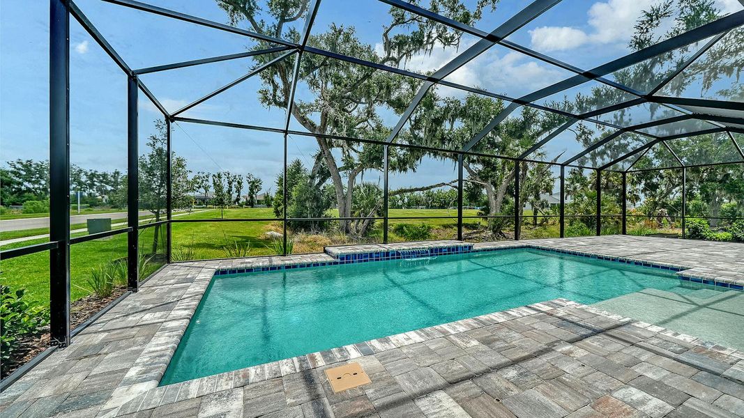 Exterior details and patio area of a home in Canoe Creek Real Estate and Homes for Sale in Parrish, FL - Neal Communities, Parrish (Image 28).