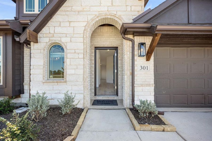Exterior details and patio area of a home in East Oak Creek 60-65, Commerce (Image 26).