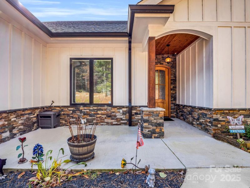 Exterior details and patio area of a home in , Mill Spring (Image 24).