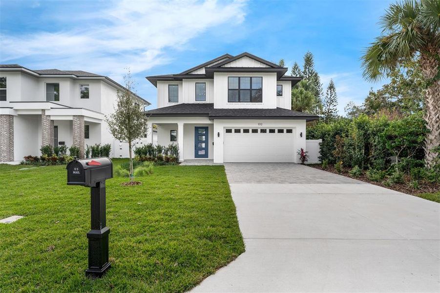 Front exterior of a new home in , Orlando, FL, highlighting curb appeal (Image 2).