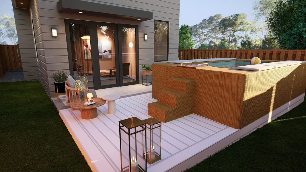 Wooden deck with french doors and a fenced backyard