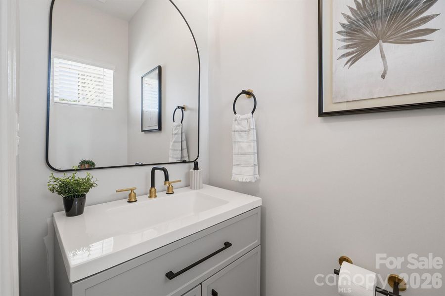 Poweder room on main with updated vanity