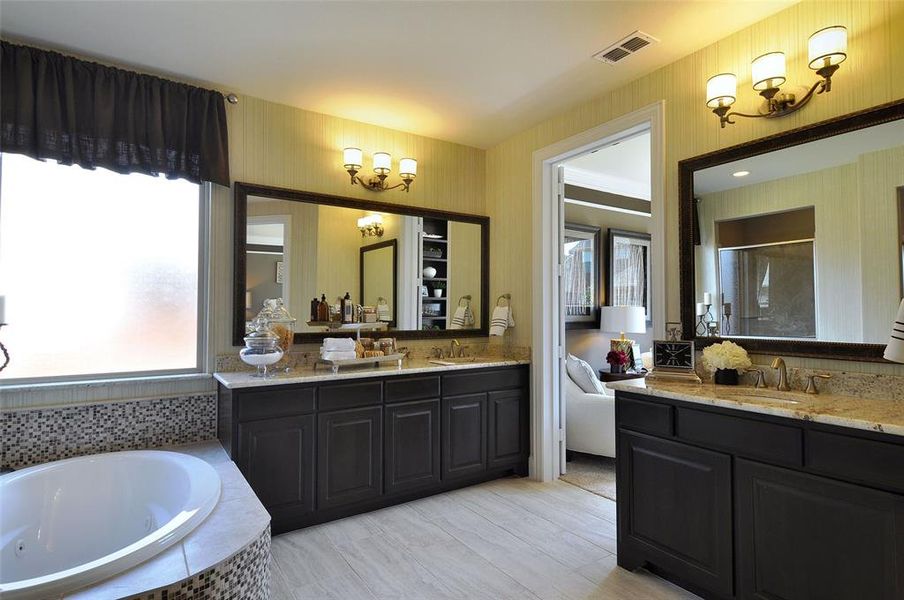 Owner's private bath with garden tub and double vanity Owner's private bath with garden tub and double vanity