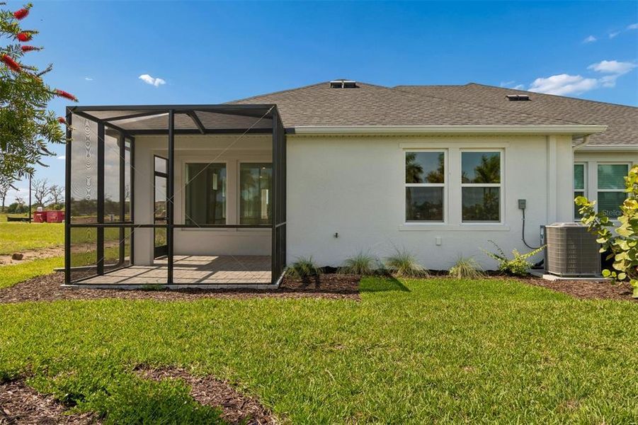 Exterior details and patio area of a home in Gracewater at Sarasota, Sarasota (Image 25).