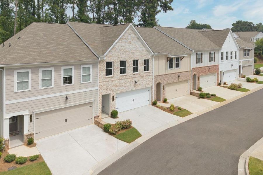 Front exterior of a new home in , Kennesaw, GA, highlighting curb appeal (Image 24).
