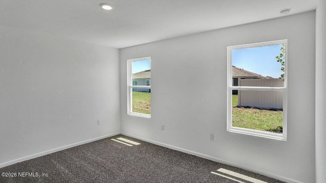 Spacious, unfurnished interior of a new home in Grand Reserve, Bunnell (Image 21).