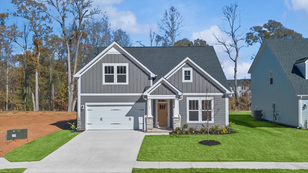 Elegant exterior with eye-catching curb appeal in a first-class DRB Homes community