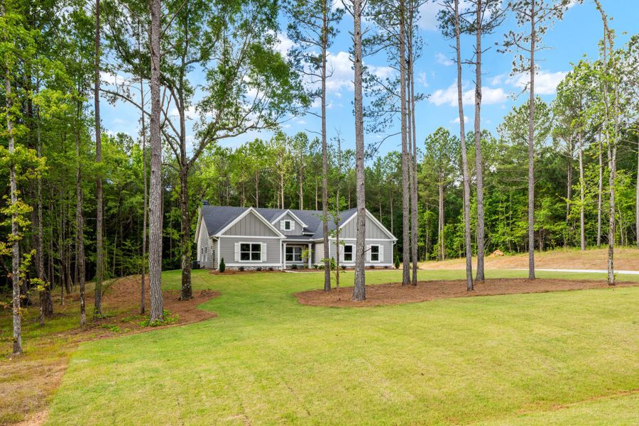 Front exterior of a new home in Flint Farms, Concord, GA, highlighting curb appeal (Image 20).