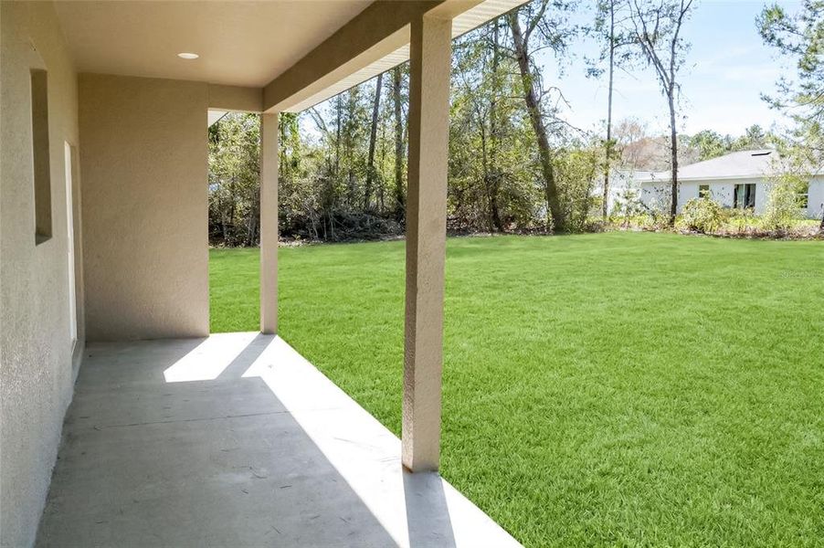 Exterior details and patio area of a home in , Citrus Springs (Image 22).